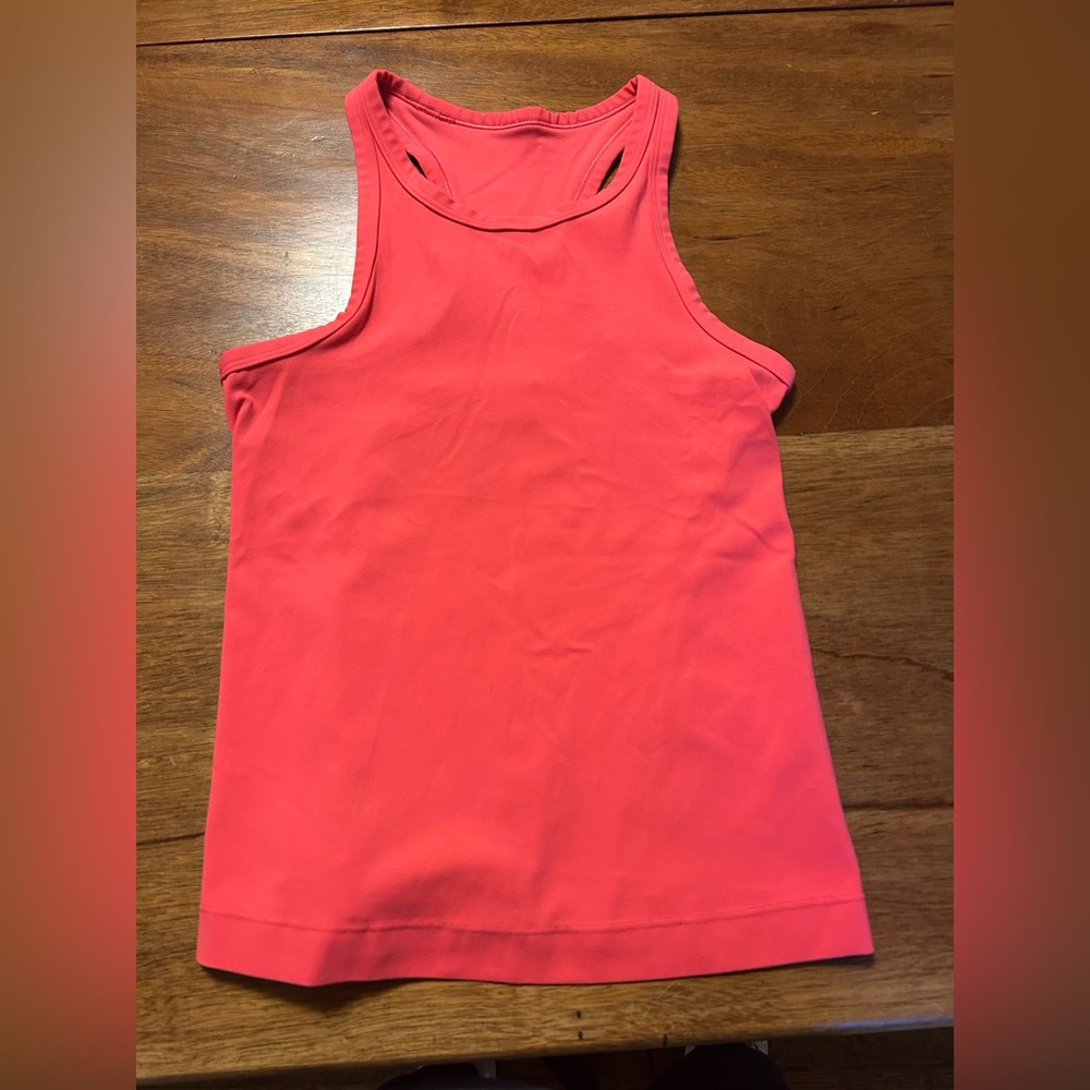 Lululemon Nulu-high neck razor back- color is Lip Gloss